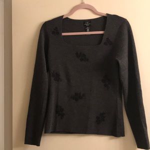 Gray merino wool sweater with floral stitching